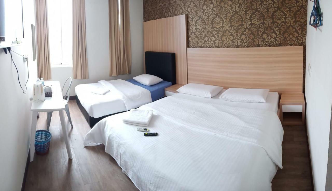 Hotel Truly Asia Кота-Кінабалу Номер фото